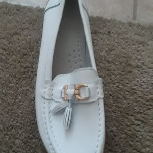 Brand new white leather loafers.